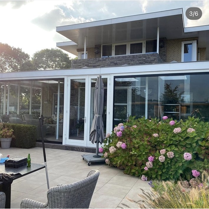 Veranda met glazen schuifwanden – projectfoto 2
